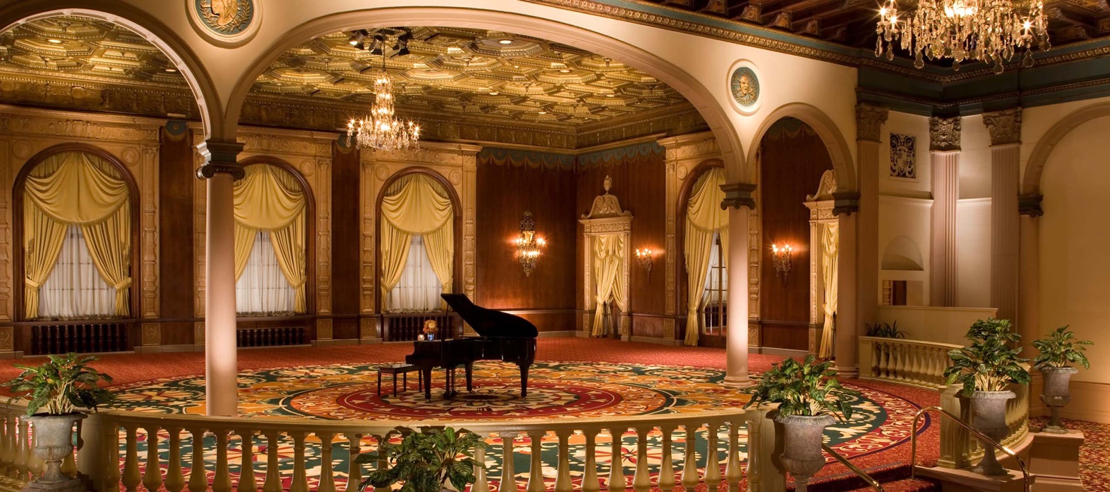 Grand room with a piano at the Millennium Biltmore
